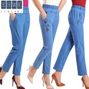 Mùa hè mỏng chín điểm trung niên đàn hồi lớn mã mẹ lưng cao lỏng eo thêu thường denim. Quần jean nữ