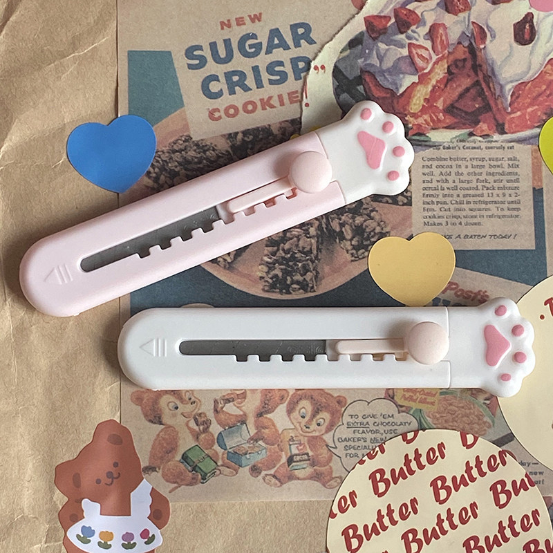 Seventeen don't sell books, cute girl heart mini carry-on MengMeng cat claw unpacking knife utility knife