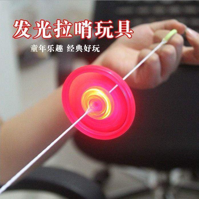 Top manual screw-spinning pull-wire flash flywheel hand-in-light flying saucer top night market goods children shine and play