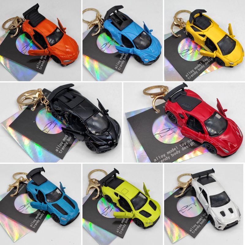 Alloy Car Keychain Pendant Wholesale, Model Car with Three Openable Doors, Pull-Back Racing Car, Backpack Pendant, Claw Machine Gift Alloy Car Keychain Pendant Wholesale, Model Car with Three Openable Doors, Pull-Back Racing Car, Backpack Pendant, Claw Machine Gift