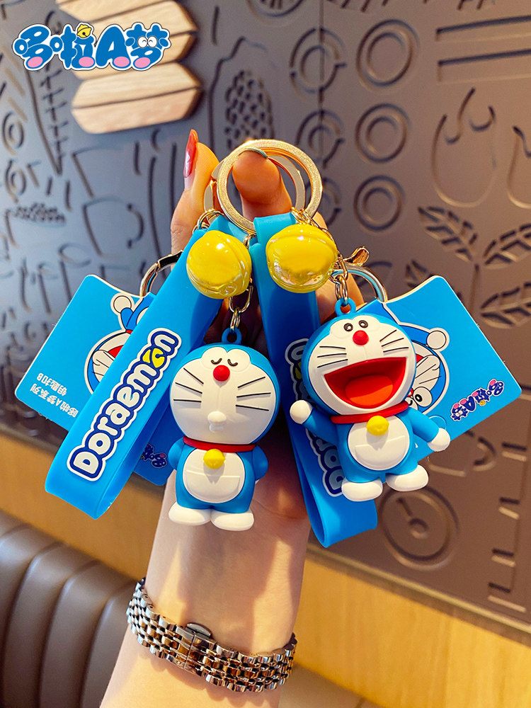 Bai Mao genuine Doraemon keychain female cute Jingle cat net red car key pendant male school bag pendant