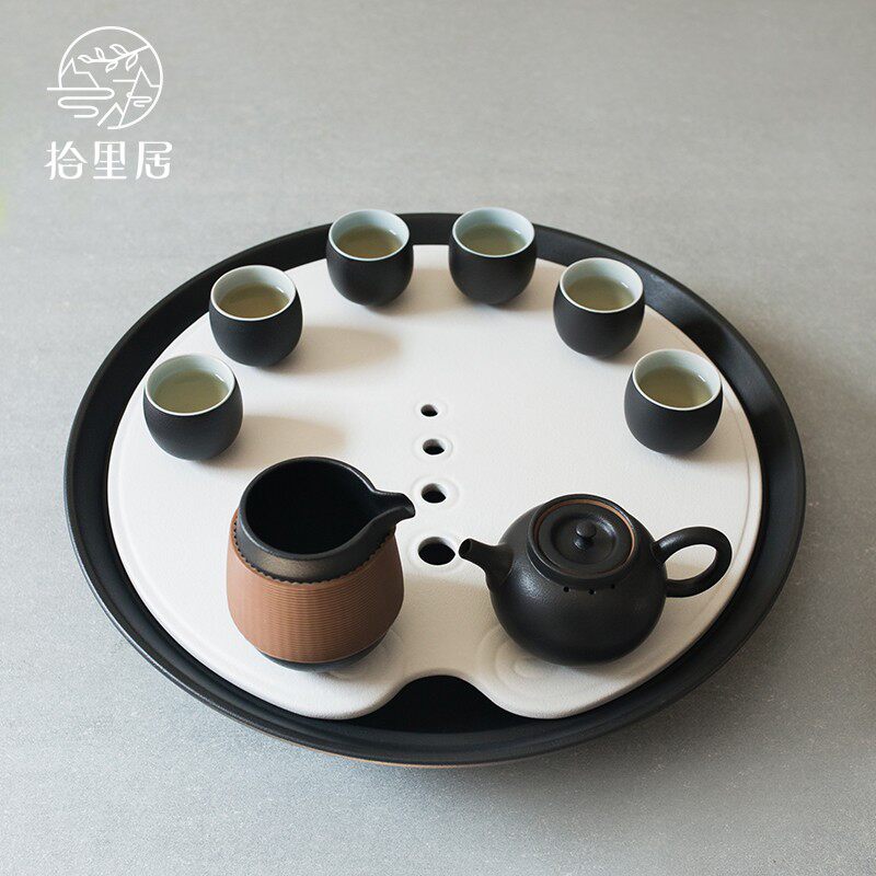 Shiliju tea tray drain pipe water storage ceramic household living room black and white simple wind round tea table tray