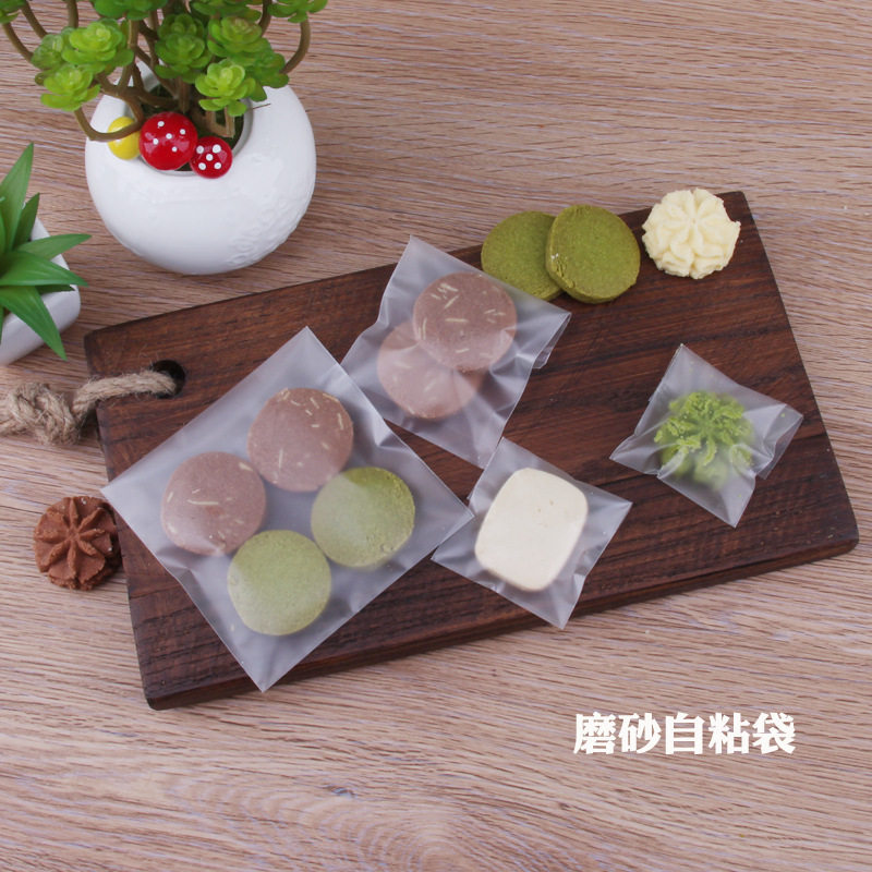 Factory sales biscuit packaging bag self-sealing bag egg yolk crisp transparent sealed frosted self-adhesive bag cranberry burdock cake