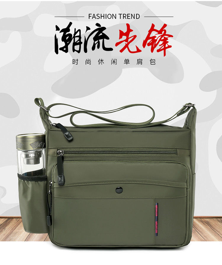 Muge men's bag trend pioneer fashion all-match large-capacity waterproof Oxford cloth bag men's shoulder messenger bag HB702