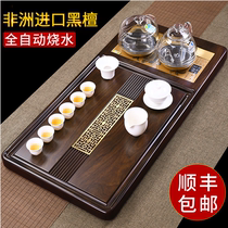 The whole ebony tea table solid wood tea tray Kung Fu tea set household living room automatic integrated induction cooker