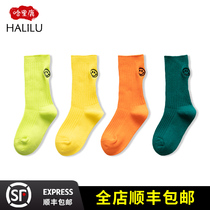 Childrens socks spring and autumn thin boys and girls in the tube personality fluorescent color smiley face summer pile socks Korean version of the tide