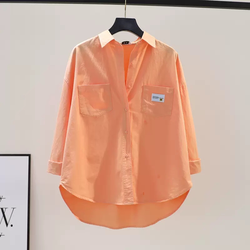 The Store Has Withdrawn the New Spring Collection: a Stylish and Unique Women's Long-Sleeved Pure Cotton Shirt in a Bright Orange Color with Double Pockets, Suitable for a Preppy and Fashionable Look