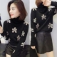 Châu Âu ga mùa thu đông 2019 hàng mới châu Âu trùm đầu cao cổ với quần short dệt kim retro áo len Hồng Kông - Vòng cổ áo len