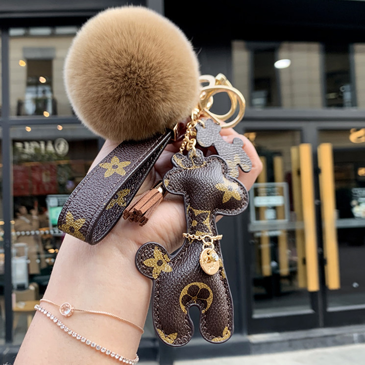 Net red European and American creative car key chain female personality giraffe key chain men and women couples bag ornaments