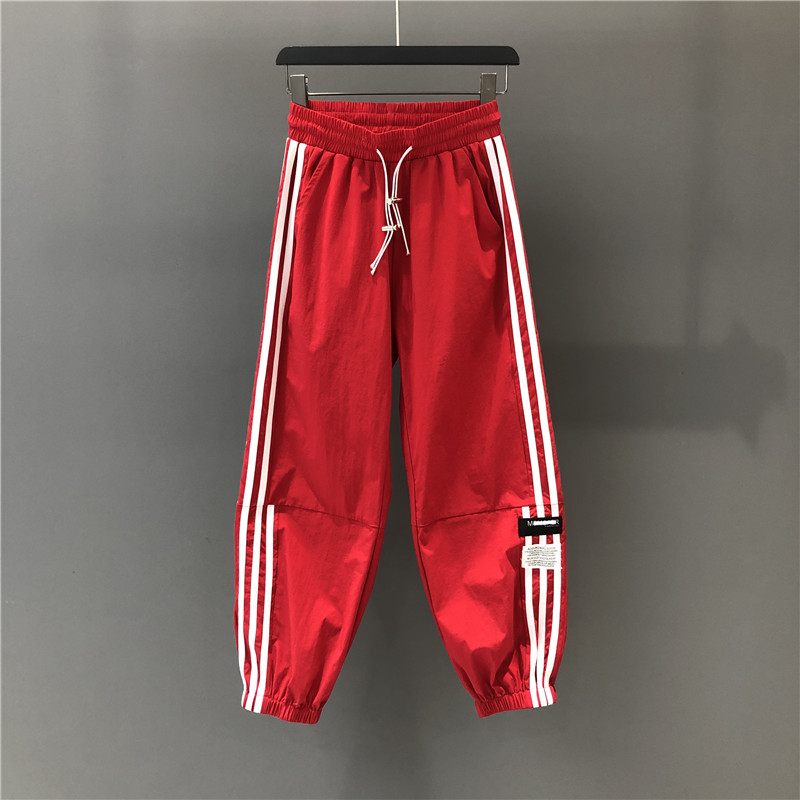 Red High-Waisted Sports Pants with Unique Stripes, Casual Pants, European Style, Women's New Spring/Summer Fashion, Loose-Fitting Jogger Harem Pants Red High-Waisted Sports Pants with Unique Stripes, Casual Pants, European Style, Women's New Spring/Summer Fashion, Loose-Fitting Jogger Harem Pants