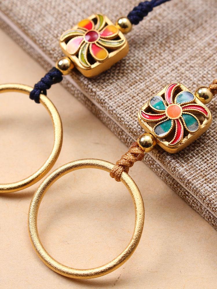 Brass ring buckle mobile phone ornaments four-petal flower key small pendant rope chain men and women sand gold pendant red ancient gold