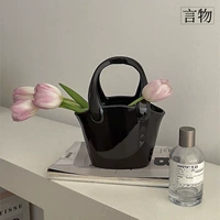 Черная бутылка-мешок (не вмещает воду)