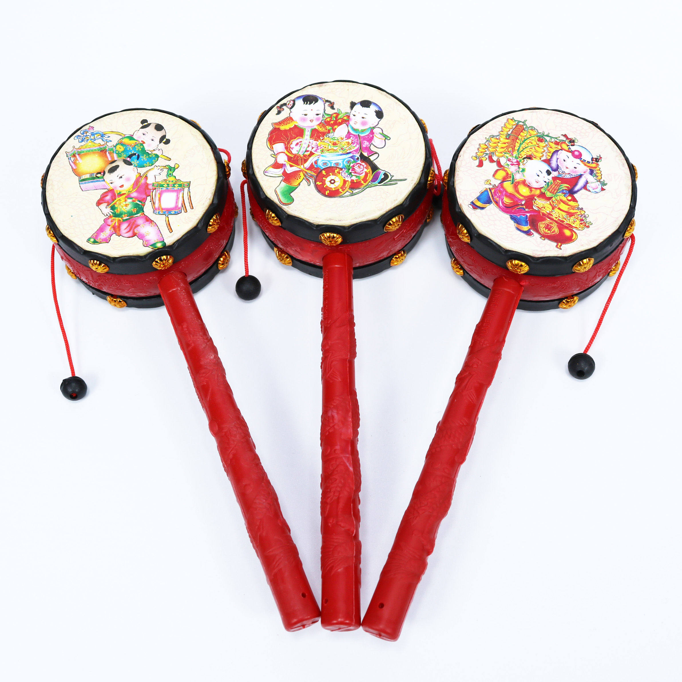 Китайский барабанчик. Погремушка барабанчик китайская. Китайский барабанчик на палочке. Китайская игрушка барабанчик