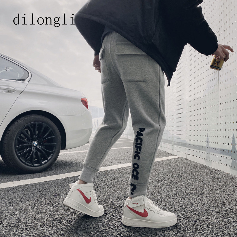 Pants men 2021 spring and autumn new slim small foot sweatpants social spirit boy Harlan knitted sweatpants