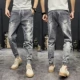 Mùa hè quần jeans dây rút co giãn Phiên bản Hàn Quốc của quần lọt khe chín điểm xu hướng quần tất nam phù hợp với quần nam - Quần jean