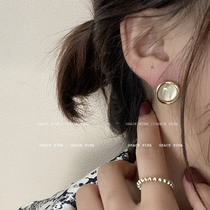 Circle the most precious you metal strips surround the cats eye stone earrings 2021 New Tide advanced sense light luxury earrings