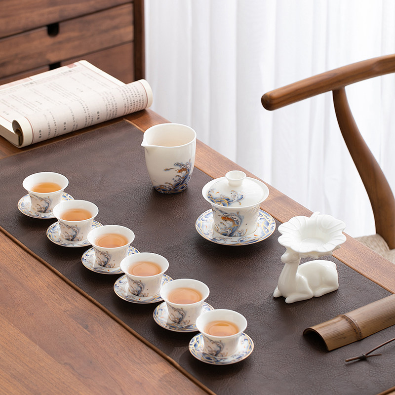Qigfu tea furniture set sheep fat jade home ceramic living room simple white porcelain whole set of cover bowl sketching kungfu suit
