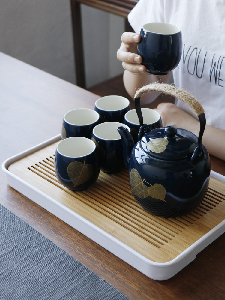 Yulan teapot set group home teacourse ceramic tea set Jingdezhen modern simple living room set of Chinese tea plate