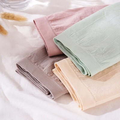 女士内裤金盒石墨烯4条装无痕抑菌中腰提臀裸氨少女学生三角内裤