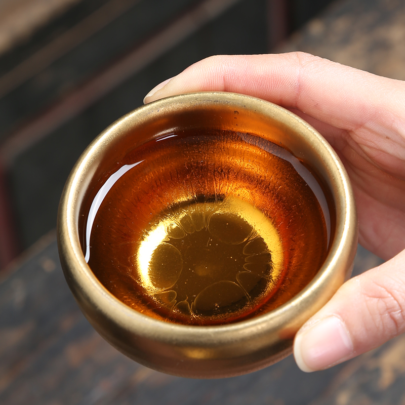 Jianyang tire iron yellow marigold oil droplets of pure gold to build light ceramic gold cup lamp that kung fu tea bowl master CPU