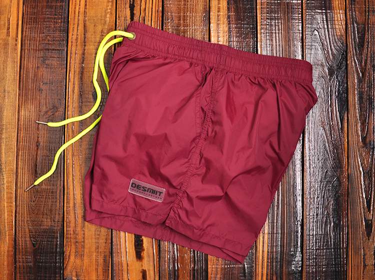 Quần short lót trong kỳ nghỉ màu đặc nhanh khô quần đi biển nam thể dục thể thao quần đùi bơi ba điểm có suối nước nóng bên bờ biển - Quần bãi biển