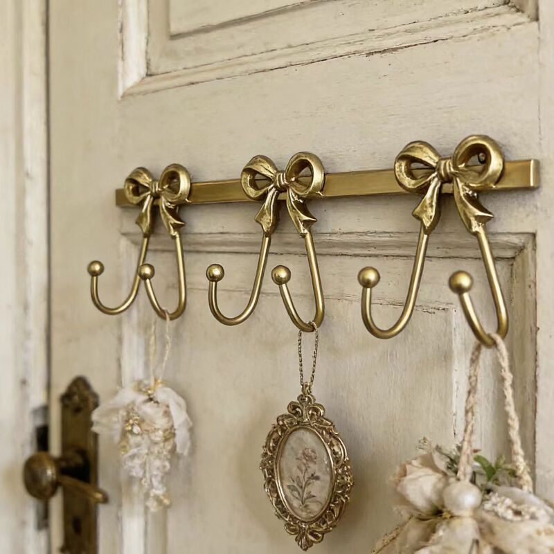 French-Style Bowknot Six-Hook Iron Art Wall-Mounted Decorative Hook for Bedroom, Heavy-Duty and Stable, Requires Drilling for Installation