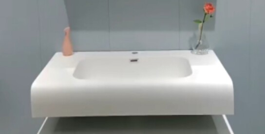 九公里柜体肤感盆工厂的LOGO