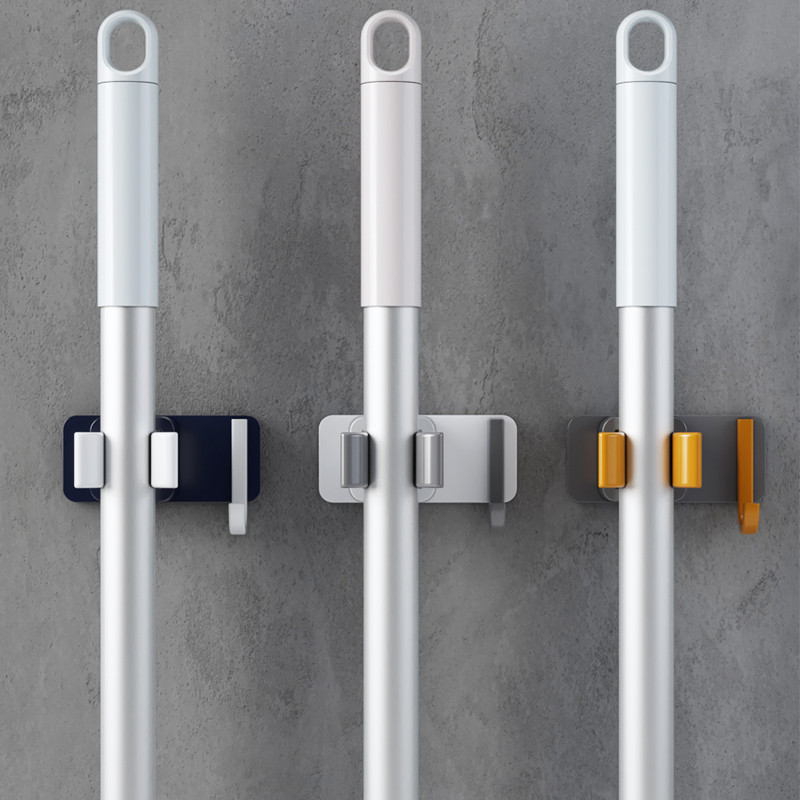 Mop hook-free hanging wall Wall God's dressing room hanging mop sweep to hold the fixed frame containing the mop clip wall-mounted