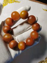 Yunnan Longling natural yellow dragon jade turf red material 20mm hand skewer new store opening leak