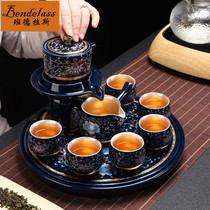 Banderas gilt silver stone mill tea set set rotating water automatic filtration Chinese household living room tea cup