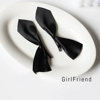 Черная заколка для волос с бантиком