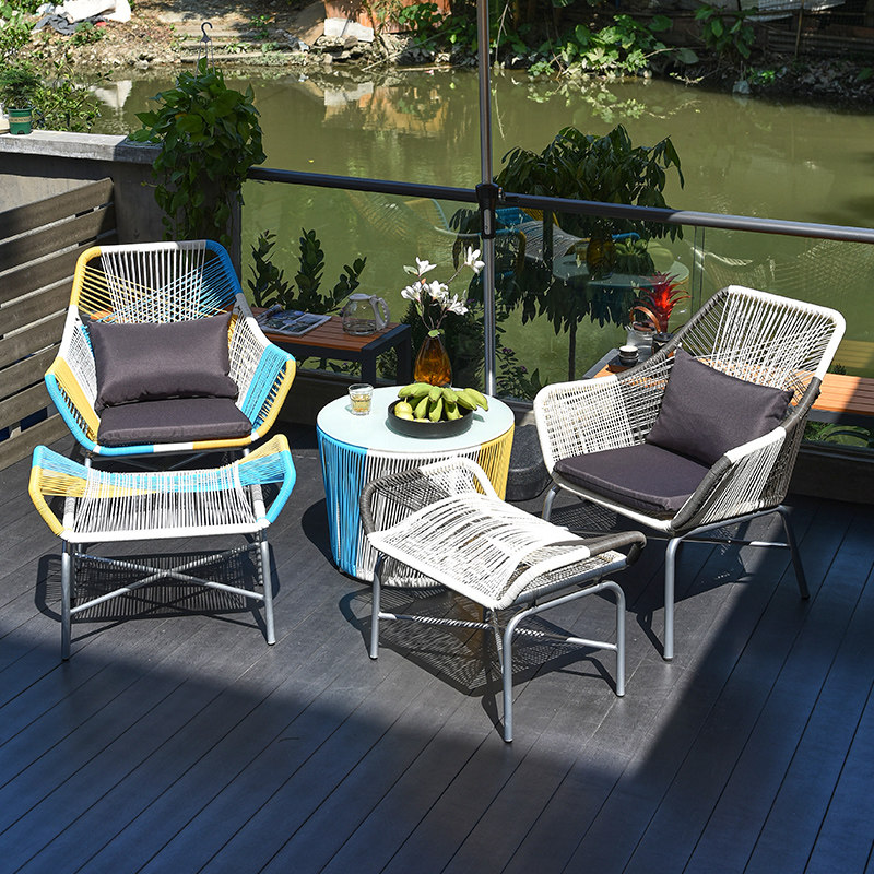 Balcony small tables and chairs red creative chair three pieces of waterproof terrace vine chair modern simple