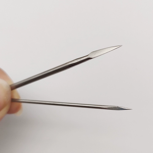 Магазин возвращает более 10 000 -летнюю магазин треугольной иглы из нержавеющей стали гематополитической иглы, прыщей, дразнящих акупунктур