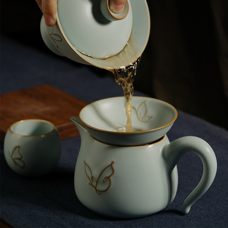 Jingdezhen porcelain tea) ceramic manual open your up filter can raise celadon undressed ore glaze kung fu tea accessories