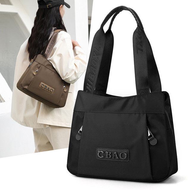 Oxford cloth shoulder handbag ແມ່ຍິງ 2024 ພາກຮຽນ spring ແລະ summer ໃຫມ່ casual waterproof nylon ຖົງເດີນທາງ canvas mom bag