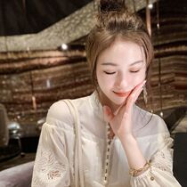 Fan-style white hook flower button shirt woman 2021 new fall temperament design small crowdsourced high-end blouse