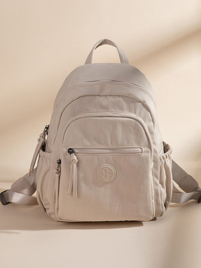 Sin cuero, tela pura, mochila ligera de nailon suave para mujer, mochila escolar para estudiantes de gran capacidad, mochila de moda de viaje