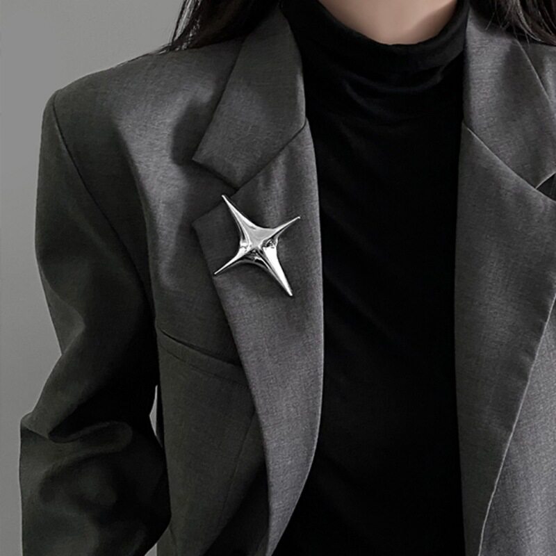 Silver cross-shaped metal suit brooch for women, new autumn style, elegant and unique design, starburst brooch.