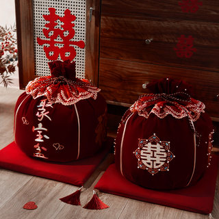 The Bride's Full Set of Dowry Items for the Wedding, Including a Red Bridal Bag and a Pair of Wedding Dowry Items