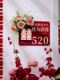 The Newlywed Couple's Bedroom Door Is Decorated with Artificial Flowers to Create a Festive Atmosphere, and the Entrance Door Is Decorated with Wedding Stickers with the Character for Happiness