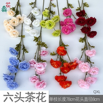 Six camellias single stems of camellia roses wedding floor flower arrangements artificial flowers reception area background wall silk flowers
