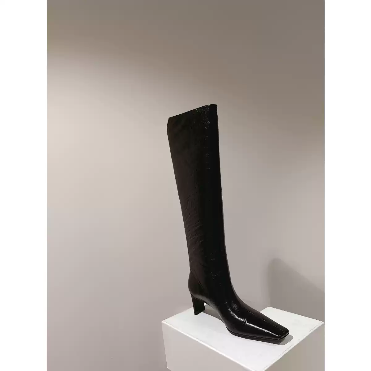 High-heeled long boots