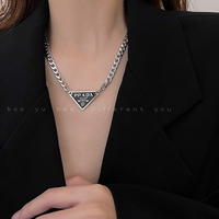 European and American letter triangle titanium steel necklace women's high-end clavicle chain non-fading hip-hop personalized sweatshirt chain accessories