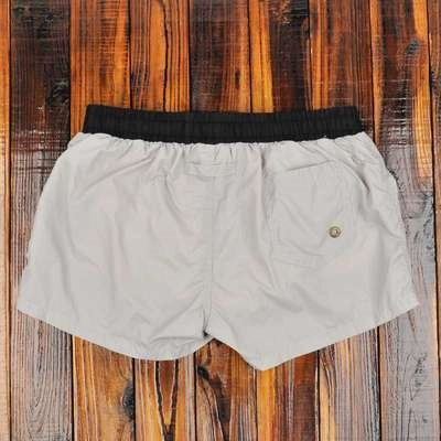 Quần đùi bơi nam cạp thấp, quần short thể thao rộng rãi thông thường, quần đi biển mùa xuân nóng đi biển có lót - Quần bãi biển