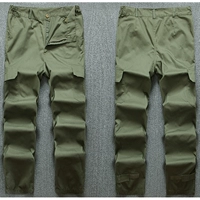 Зеленые тонкие штаны, свободный прямой крой