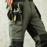 Много -карманные брюки для рабочих износов -Устойчивые к брюкам с страхованием рабочей силы автоматическое ремонт автофекторов Фабрика Многофункциональный работник оксфордские колени мужские брюки