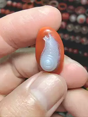 Xiaosuchuan material South red agate persimmon red ice floating old hand hand string pendant accessories snail Golden Toad disciple