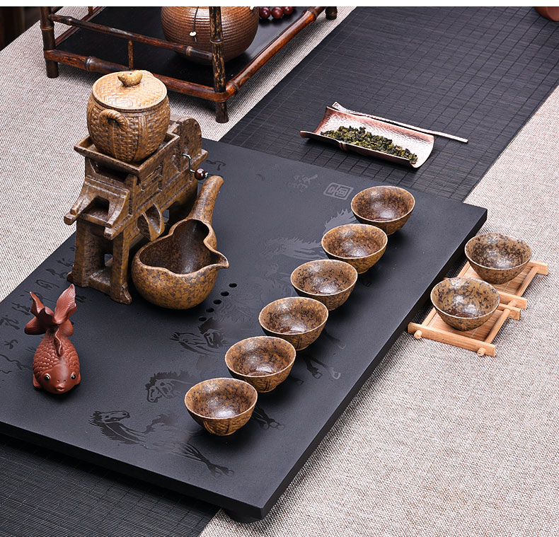 A complete set of creative lazy automatic ceramic kung fu tea set, the household of Chinese style restoring ancient ways millstones teapot cup suits for