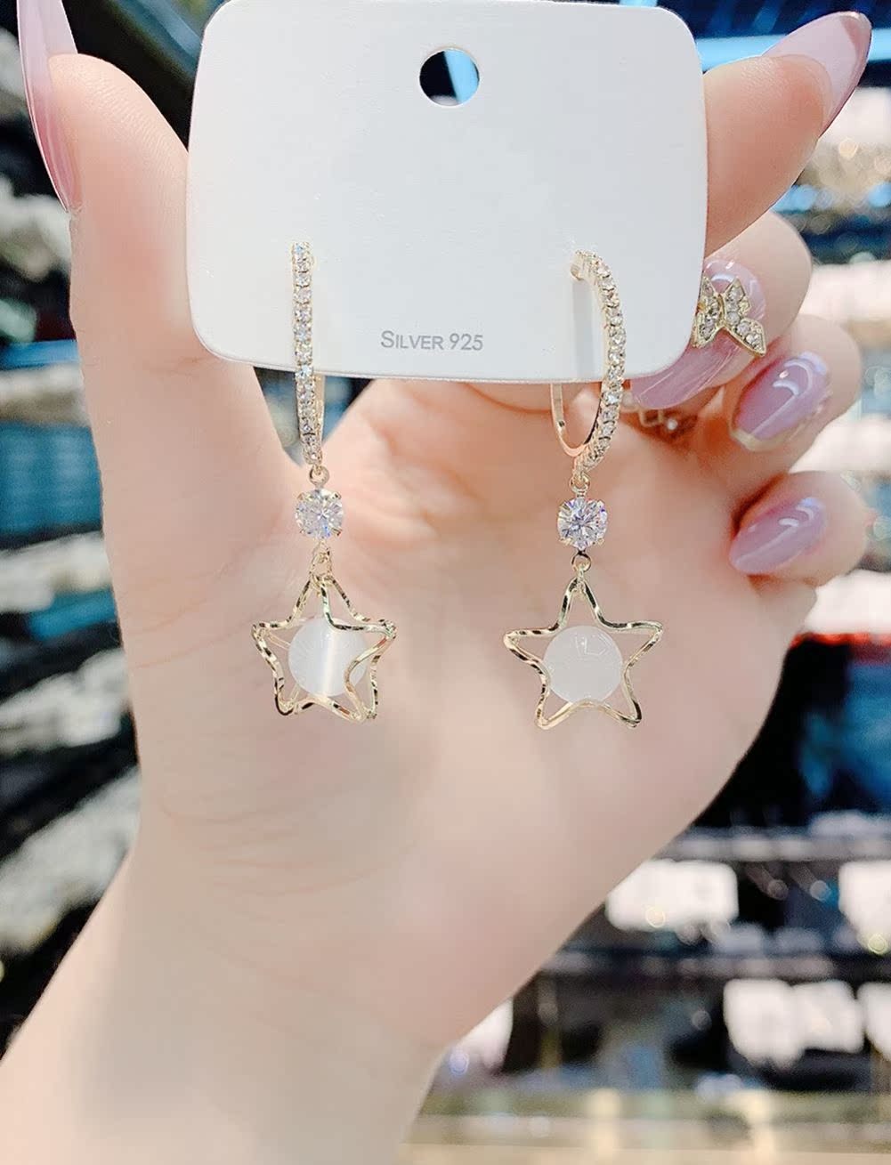 Star earrings female 2021 new trendy high-end opal earrings summer niche cold wind sterling silver earrings