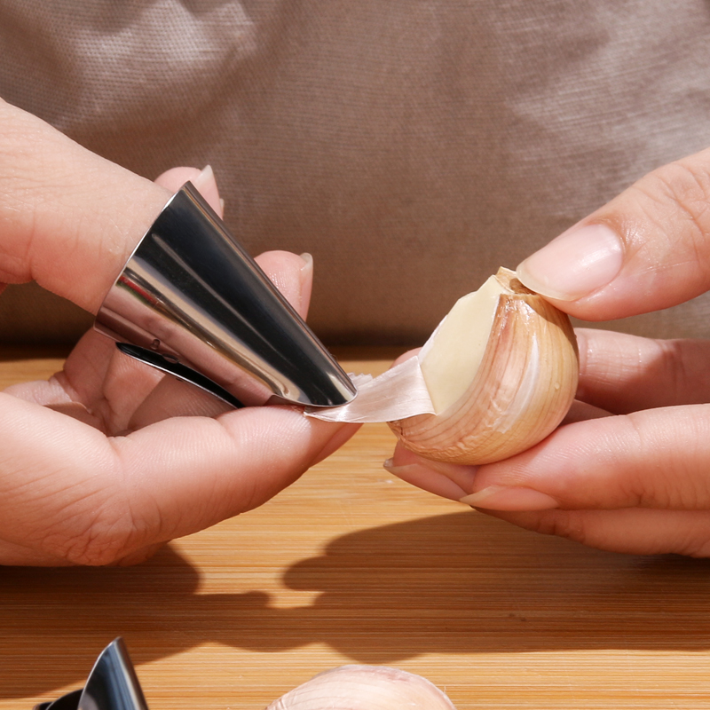 Stainless steel peeling bean artifact peeling garlic steak broad bean soybean iron nail guard finger picker peeling tool